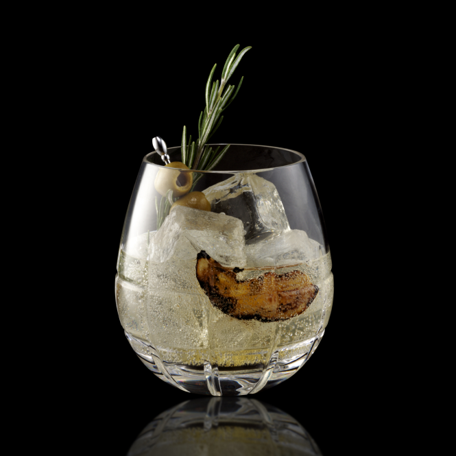Dirty mezcal and tonic cocktail made with Mezcal Creyente